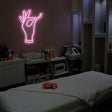 Hand Holding Eyelash Neon Sign | NEON SIGNO® Custom Neon Signs